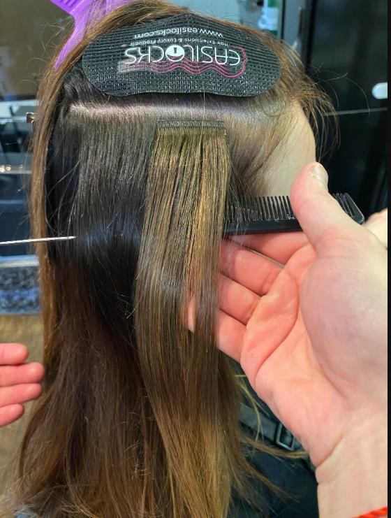 Weft hair extension application at Vogue Hair Studio