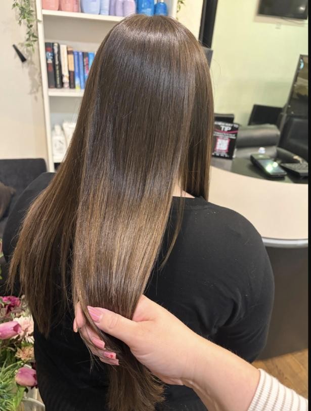 Smooth, sleek hair after ProAddiction treatment at Vogue Hair Studio