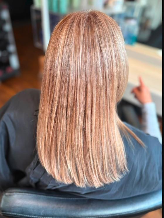 Straight blonde finish at Vogue Hair Studio